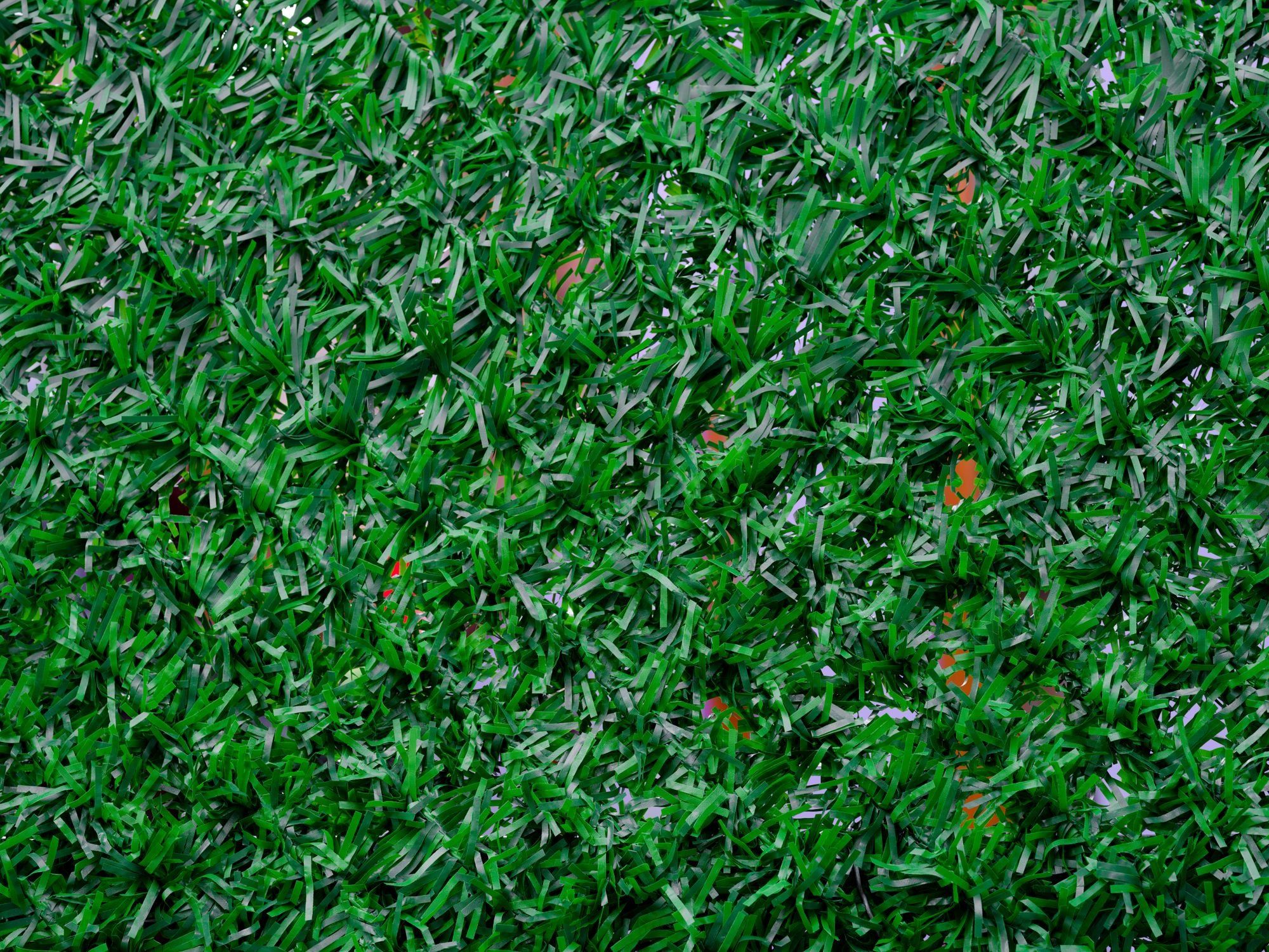 A close-up of green artificial grass blades